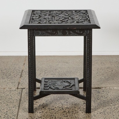 A Carved Oak Occasional Table
