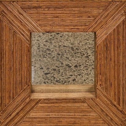 A Cane Framed Mirror