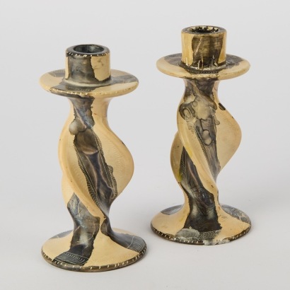 A Pair Of Soapstone Candle Holders