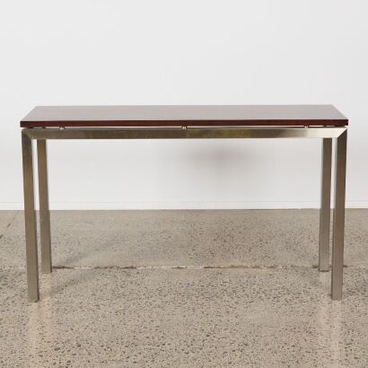 A Brown Wood Console with Brushed Steel Legs
