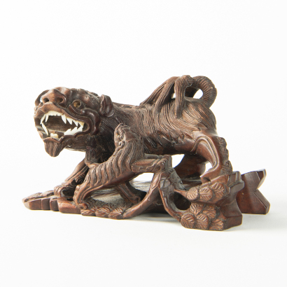 A Chinese Aged Wooden 'Lion' Ornament - The Collection of John Perry's Asian Art