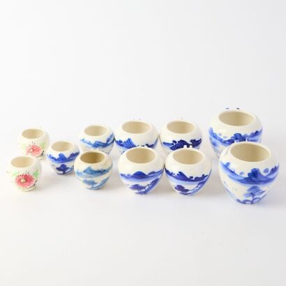 A Collection of Chinese Blue and White Bird Feeders