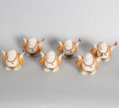 A Group of Six Chinese Foshan Small Monk Statues