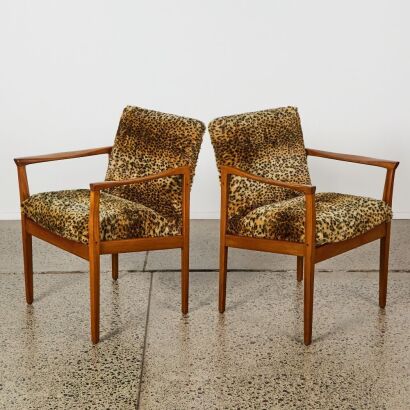 A Pair Of Mid-Century Chairs With Faux Fur Upholstery