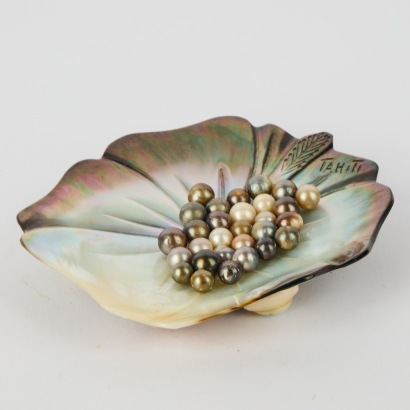 A Tahitian Carved Shell Dish and Black Sea Pearls