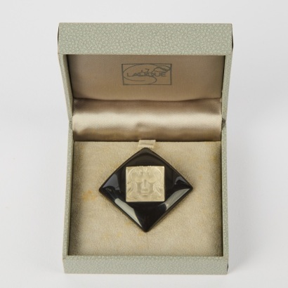 A Lalique Ar&eacute;thuse Masque de Femme Crystal and Resin Brooch