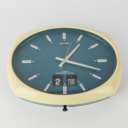 A Mid-Century Japanese Rhythm Clock with Flip Date