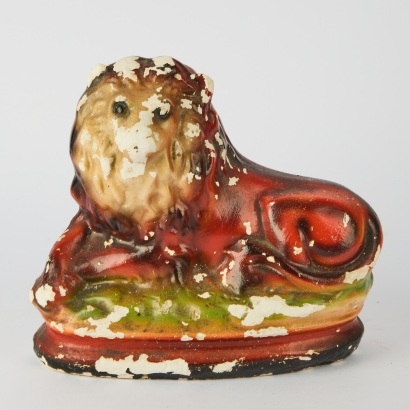 An Antique Chalkware Lion