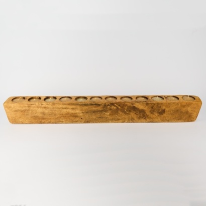 A Rustic Wood Candle Holder With 12 Candles