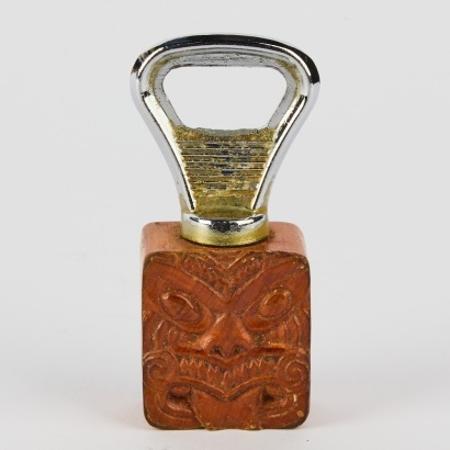 A Wooden Māori Tiki Bottle Opener