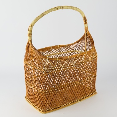 A Large Rattan Handwoven Picnic Basket