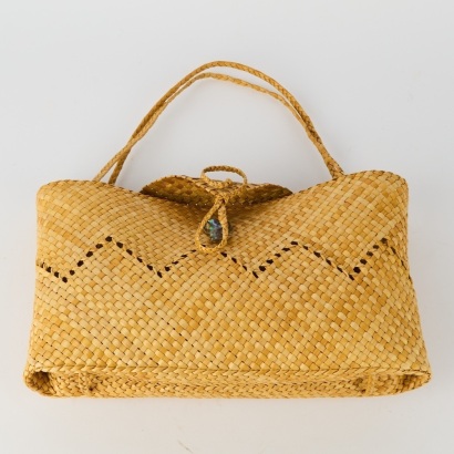 A Kete Bag with Pāua Buckle