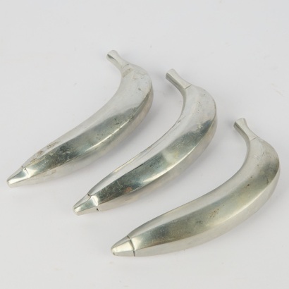 A Trio of Aluminium Decorative Bananas