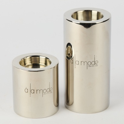 A Pair of 'A La Mode' Chrome Candlesticks