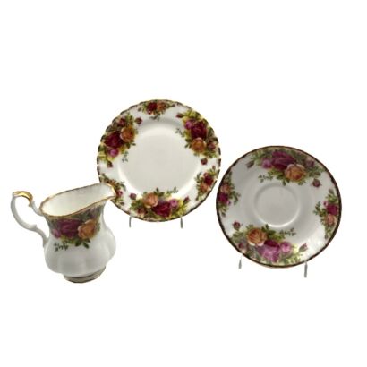 Three Royal Albert Pieces - 1 Milk Jug and Two Saucers