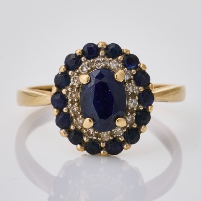 10ct Yellow Gold, Oval Sapphire / .08ct Diamond Cluster Ring