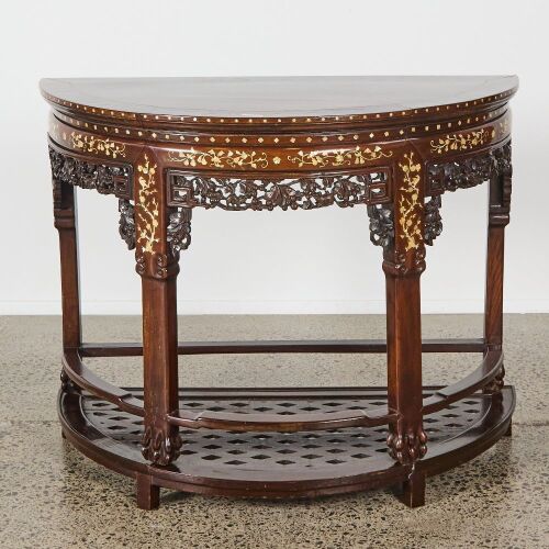 A Late 19th to Early 20th Century Chinese Hardwood and Mother-of-Pearl Inlaid Carved Demi-lune Table