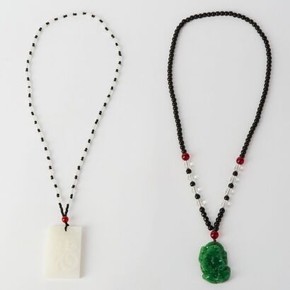 A Chinese White Jade &lsquo;Fu&rsquo; Pendant and A Green Glass Pendant