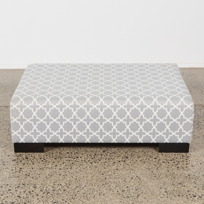 A Moroccan Quatrefoil Grey Ottoman