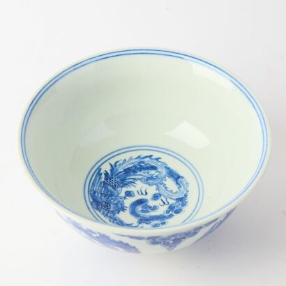 A Chinese Blue and White &lsquo;Dragons and Phoenix&rsquo; Bowl (Qing Dynasty Kangxi year mark)