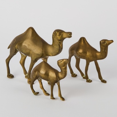 A Caravan of Three Brass Camel Figures