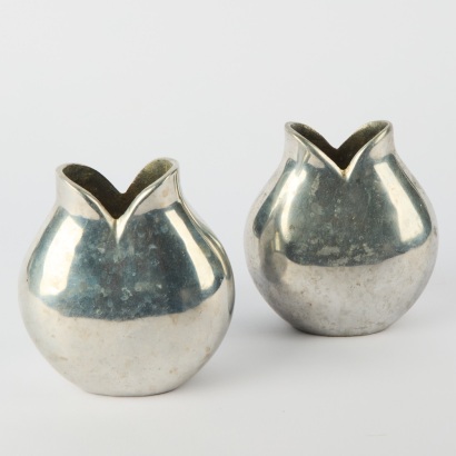 A Pair of Polished Aluminium Cast Vases