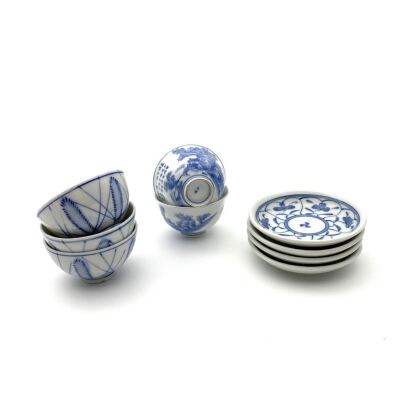 A Group of Nine Japanese Blue and White Cups and Saucers