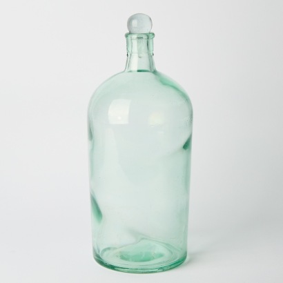 A Large Glass Bottle with Stopper