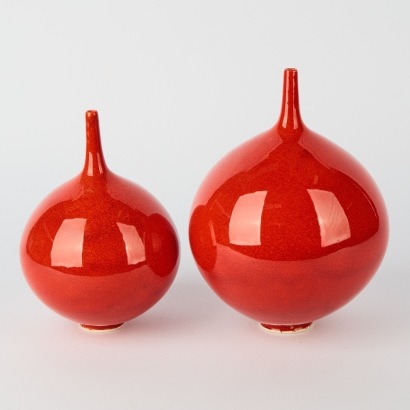 A Pair of Peter Collis Red Orb Vases