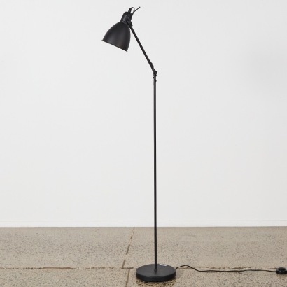 An Industrial Black Reflector Task Floor Lamp