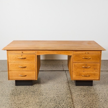 A Mid-Century Oak Twin-Pedestal Executive Desk