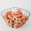 A Basket of Ceramic Dolls Legs