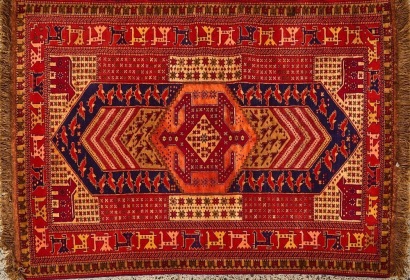 A Hand-Knotted Quchan Wool and Silk Rug