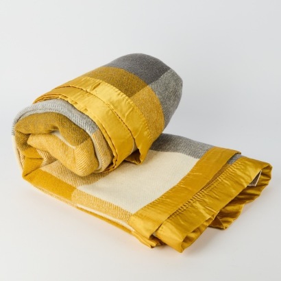 A Woolrest Blanket in Grey and Yellow