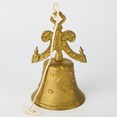 A Larger Antique Brass Sun and Moon Bell