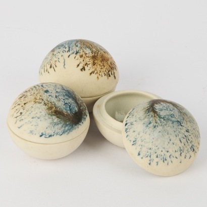A Set of Three Margerat Milne Spherical Trinket Boxes