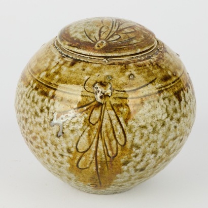 A Flora Christella Salt Glazed Jar with Lid