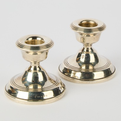 A Pair of Antique Sterling Silver Candlestick Holders