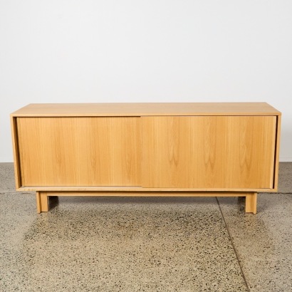 A Contemporary Solid Oak Sideboard with Sliding Doors