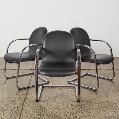 A Set of Three Leather Cantilever Chairs