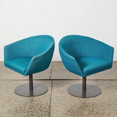 A Pair of Mid-Century Swivel Tub Chairs
