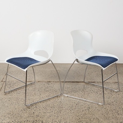 A Pair of Minimal Sleigh Base Chairs