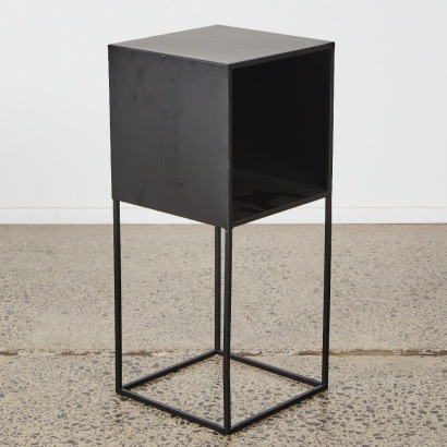 A Cubed Black Metal Storage Unit
