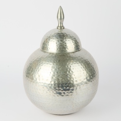 A Hand-Hammered Metal Table Feature