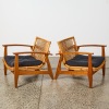 A Pair of Teak Bamboo Lounge Chairs