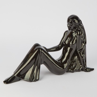 A Seated Lady Made from Porcelain
