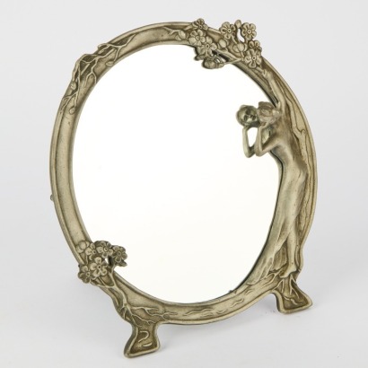 An Art Nouveau Style Metal Mirror