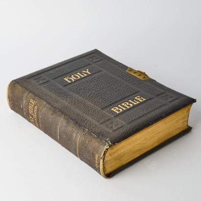 A Large Antique Holy Bible with Brass Clasp
