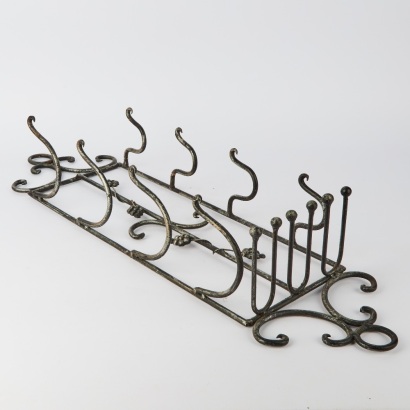 A Metal Wall Mounted Wine Bottle Rack