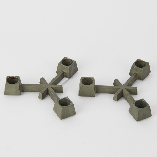 A Pair of Mid-Century Jens H. Quistgaard Candle Holders